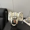 White punk shoulder bag featuring silver rivets and metal buckle in leather finish - White
