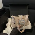 Beige punk rivet shoulder bag with silver hardware and vintage belt buckle detail - Khaki