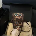 Bolso bandolera retro de tejido geométrico con ribetes de cuero y colgante metal - Verde