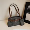 Chic dark gray washed denim crossbody bag with brown leather straps and small pouch - Main Bag And Mini Pouch / Black