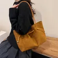 Caramel matte tote bag for women featuring drawstring side with metallic silver spheres - Yellow Brown
