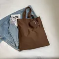 Dunkelbraune Nylon-Einkaufstasche mit Augen-Stickerei und faltbarem Design für Damen - Kaffeebraun