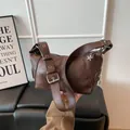 Retro dark brown dumpling shoulder bag with lychee texture and star pendant - Brown