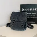 Vintage dark gray washed denim backpack with metal buckle flap for casual travel - Smoke