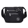 Black nylon crossbody bag with multi-pocket design and adjustable strap for casual use - Black