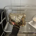 Elegant gold sequined small square bag with metallic chain strap for formal events - Gold