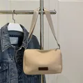 Minimalist beige water-resistant nylon crossbody bag with fashion leather tag and wide strap - Khaki