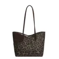 Large leopard print tote bag with dark brown leather handles on white background - Green with Charm