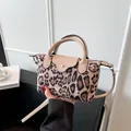 Brown leopard print nylon crossbody dumpling bag with beige leather trim and top handle - Khaki