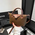 Brown teddy fleece mini handbag with caramel leather trim and detachable shoulder strap - Coffee