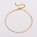 Golden stainless steel anklet with pink enamel oval beads and lobster clasp closure - Gold - Pink Enamel