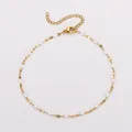 Adjustable gold plated O-chain anklet featuring white oval enamel charms and lobster clasp - Gold-White Enamel