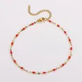 Golden stainless steel O-chain anklet with vibrant red beads and lobster clasp - Gold-Red Enamel