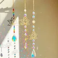 Detail of crystal sun catchers with golden lotus pendants reflecting rainbow light spots - Lotus Star Suncatcher Hanging Decor (A Style)