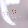 Acchiappasole a stella dorata con cristalli colorati e prismi con effetto arcobaleno - Pentagramma