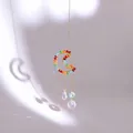 Acchiappasole a mezzaluna dorata con perle arcobaleno e pendenti in cristallo sfaccettato - Luna