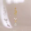 Macro detail of sun and moon crystal suncatcher reflecting rainbow light spots on wall - 42.5cm / Crescent Moon and Star Style