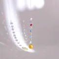 Detail of spiral suncatcher with rainbow beads and amber crystal ball prism - Multicolor Beads With Golden Ball (Swivel Ring Style)
