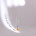 Detail of crystal suncatcher showing colorful faceted beads and a teardrop pendant - Silver Rotating Yellow Teardrop Style / Silver Spiral Yellow Teardrop Pendant