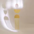 Modern pink crystal wind chime with golden copper tubes and geometric metal hanging plates - Rose Quartz Raw Stone Style (Style 4)