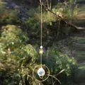 Detail of sun-shaped golden suncatcher with crystal ball reflecting light in nature - AB Colorful Crystal Ball (Large)