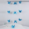 Detalle de mariposa 3D azul de doble capa con purpurina para decoración de fiestas - Aprox. 2m de largo / Azul