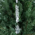 Macro detail of acrylic snowman ornament hanging on green Christmas tree branch - Snowman Style Two / Clear White