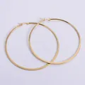 Polished golden stainless steel large hoop earrings with minimalist flattened wire design - Gold / 85mm