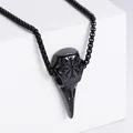 Detail shot of black stainless steel raven skull pendant with Viking compass engraving - Pendant Only / Black