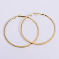 Minimalist large hoop earrings in shiny gold finish with sleek stainless steel design - Gold / 75mm