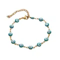 Detail of 6mm evil eye charms on gold-plated stainless steel chain with lobster clasp - Emerald Green