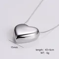 Detailansicht des polierten Herzanhängers mit 15mm Größe und 43+6cm Schlangenkette Maße - Klein (15MM) / Silber