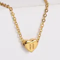 Golden 18K plated heart pendant necklace featuring an embossed letter H design - Letter H