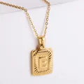 18k gold plated rectangle letter E pendant necklace with diamond cut radial texture - Letter E