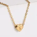Polished 18K gold plated heart pendant necklace with letter S on a classic O-chain - Letter S