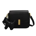 Minimalist black leather square crossbody bag with gold buckle and dog charm detail - Large / Black