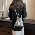 Silberne Strass-Beuteltasche mit rundem Griff und abnehmbarem Schultergurt für Damen - Silber