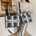 Borsa tote in tela a righe verticali MYCARE in due dimensioni con tracolla regolabile - S / Righe Nere