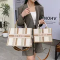Borsa tote in tela a righe beige e kaki in dimensioni medie e grandi con tracolla - Quadri Giallo