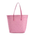 Vibrant pink woven straw tote bag with long leather handles and gold rivet accents - Pink