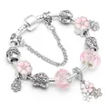 Bracelet à breloques en maille serpent avec cerisiers en émail rose et perles cristal - Rose