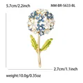 Elegante blauw-witte strass hortensia broche met goudkleurige steel en groene bladeren - Stijl 5633 / Blauw