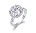 Macro shot of S925 sterling silver ring featuring a halo-set moissanite and pavé band - US Size 5 / R15178 - Round 5-carat Moissanite Ring