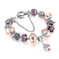 Pandora style crown charm bracelet with pink rhinestones and orange faceted glass beads - 17cm / Pink
