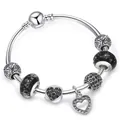 Bracciale in argento 925 con ciondoli a cuore e perle floreali in stile vintage - Nero