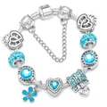 Silver charm bracelet with blue heart pendant and Love Is Forever engraved beads - 16cm / Blue