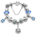 Silver charm bracelet with blue glass beads, gradient rhinestones and snowflake pendant - 16cm / Blue