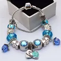 Silver-plated snake chain charm bracelet with blue crystals and heart-shaped mother pendant - 16cm / Blue
