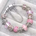 Elegant silver-plated charm bracelet featuring pink glass beads and crystal accents - Pink / 16cm
