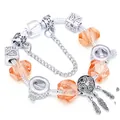 Silver charm bracelet with orange crystal beads and dreamcatcher feather pendant - 16cm / Orange